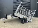 7x4-Box-Trailer-Tipper-Single-Axle-Galvanised-900mm-Cage-Ladder-Racks-Toolbox-750kg-ATM-1.webp